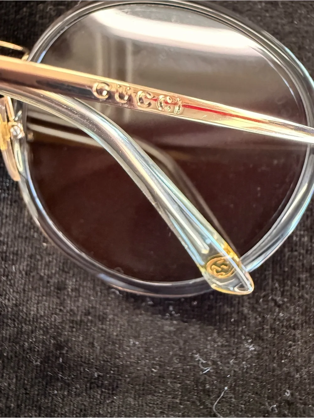 Gucci Black and Gold Round Frame Sunglasses